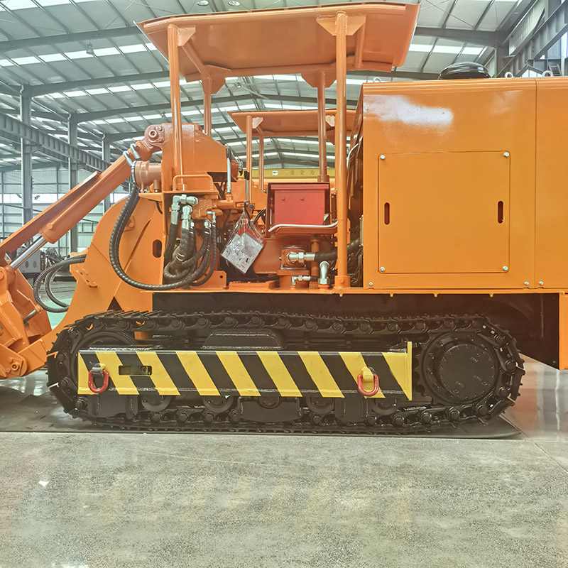 Chargeuse de roches à déchargement latéral 60