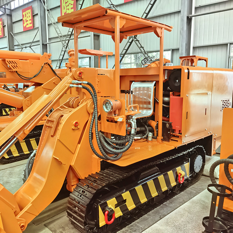 Chargeuse de roches à déchargement latéral 60