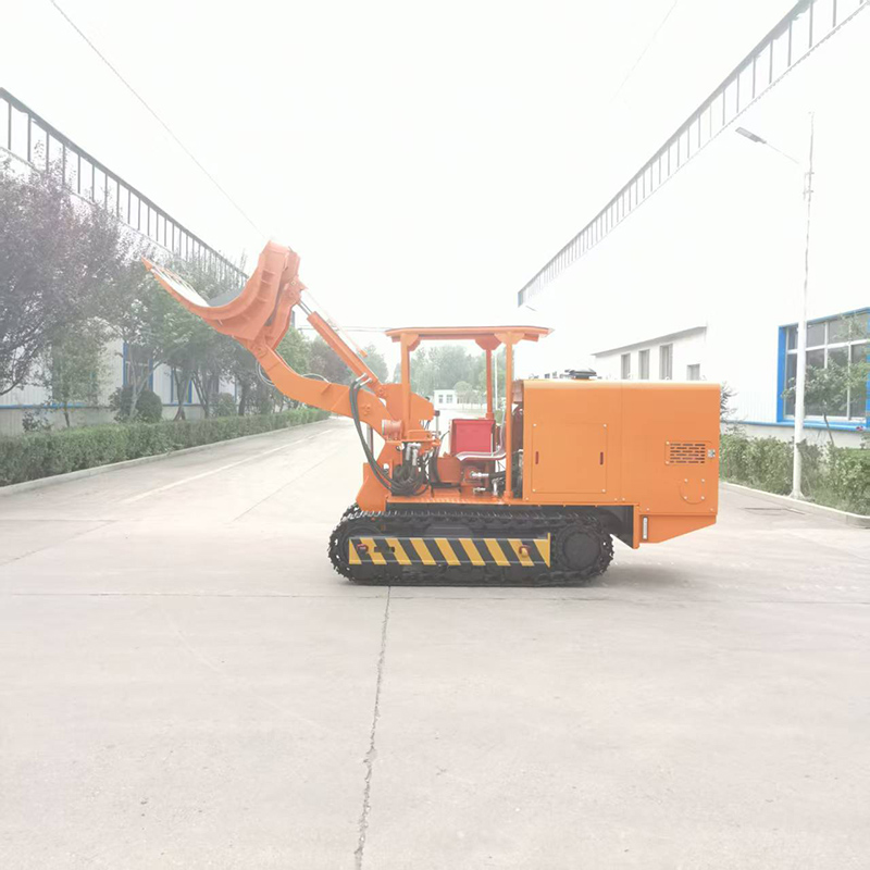 Carregador de rochas de grande porte com descarga lateral