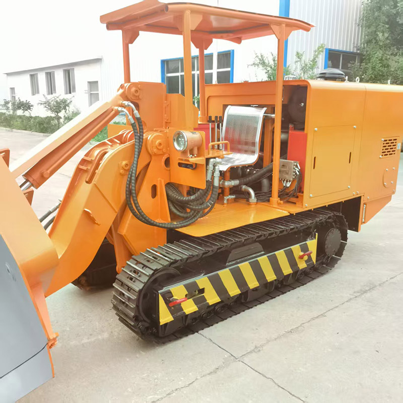 Chargeur de roches à déchargement latéral pour mines d'or