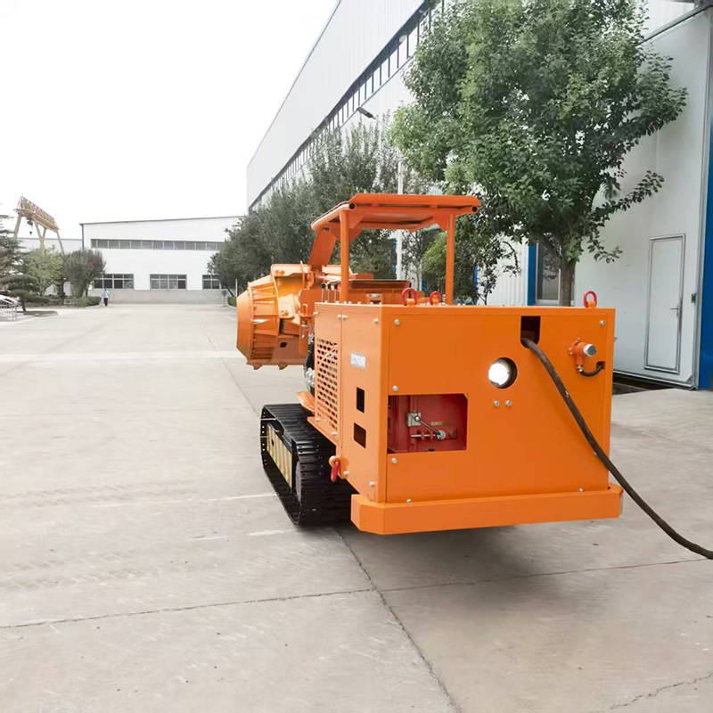 Carregador de rochas de descarga lateral pequena