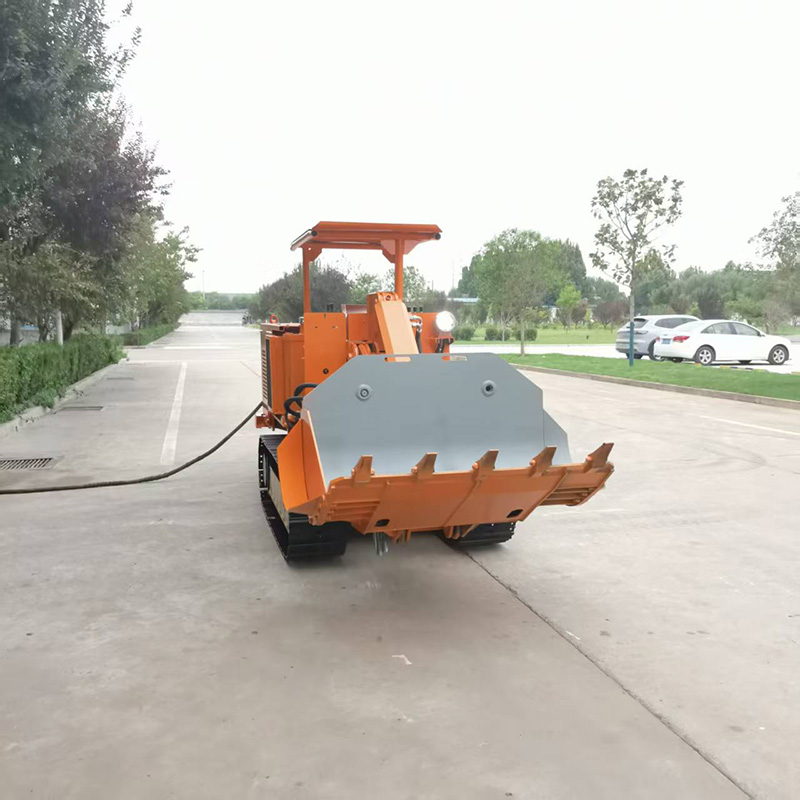 Carregador de rochas de descarga lateral pequena