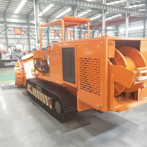 Быстросменный погрузчик для каменной щебенки с боковой разгрузкой Быстросменный погрузчик для каменной щебенки с боковой разгрузкой